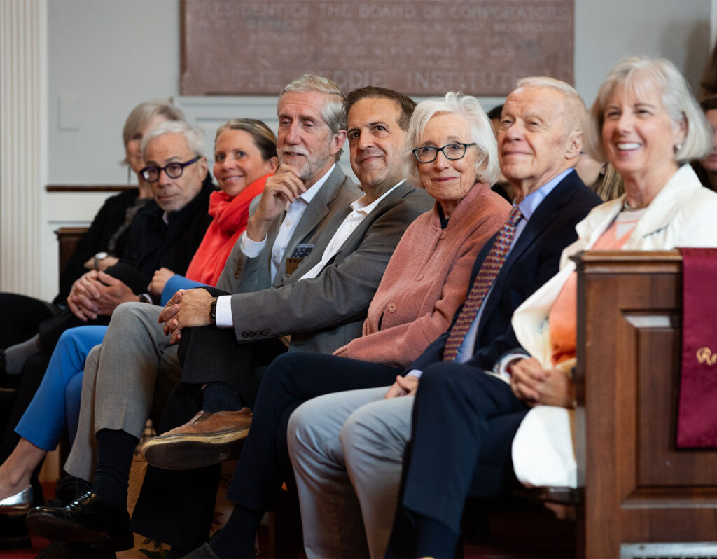 board of trustees members sitting in chapel