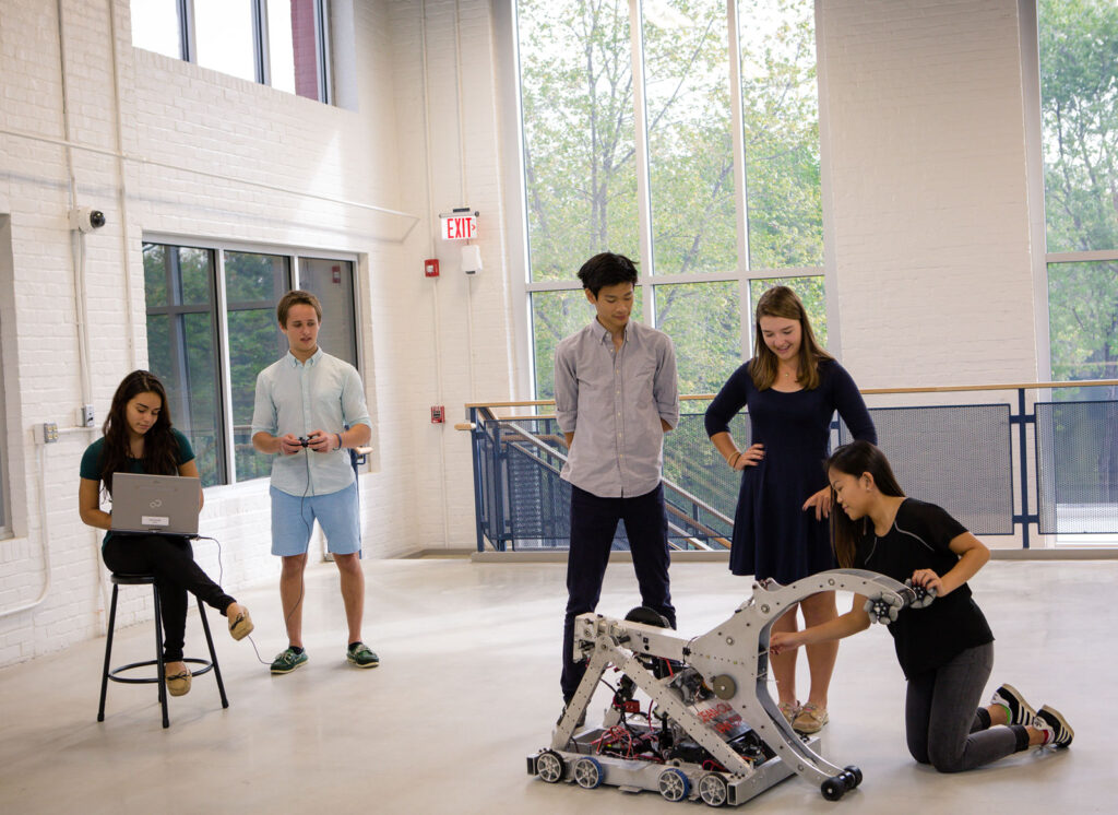 Students testing a robot in Peddie's Izzo Design Laboratory