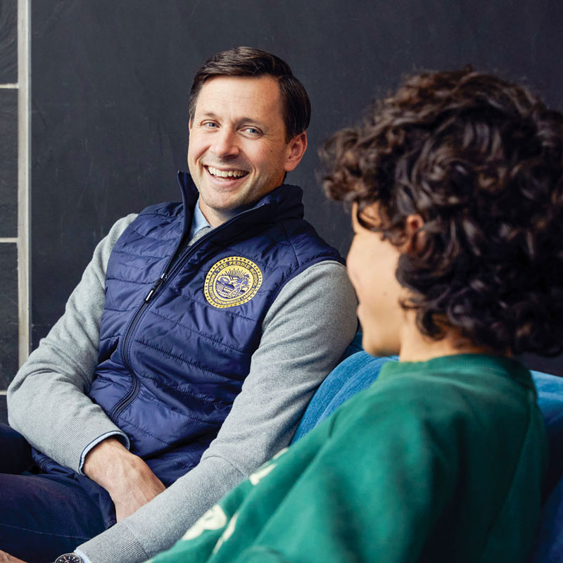 Peddie Director of Athletics Rich D'Andrea speaks with a student athlete.